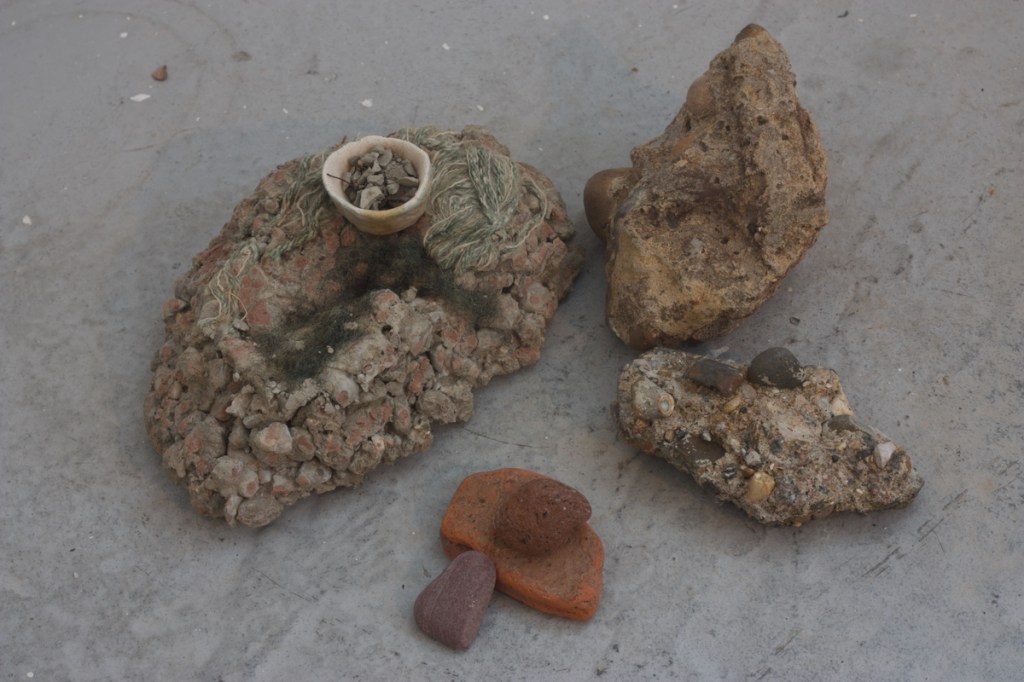 Cast and foraged concrete, river-worn London bricks